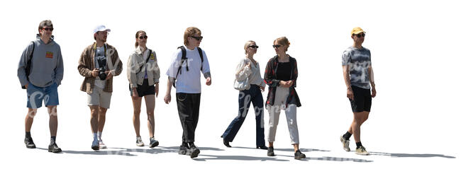 group of backlit young people walking