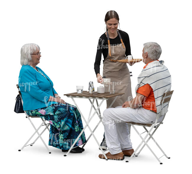 waitress serving drink to an elderly couple