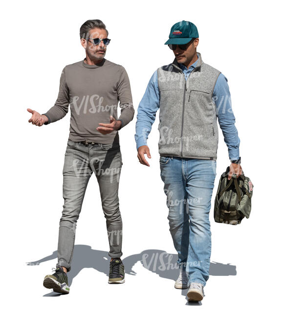 two men walking in the street and talking