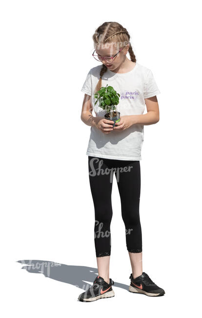 cut out little girl with a plant standing in the garden