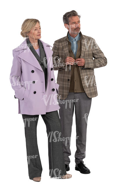man and woman with light overcoats standing
