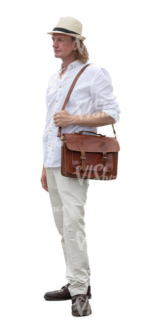 man with a hat and white summer shirt standing