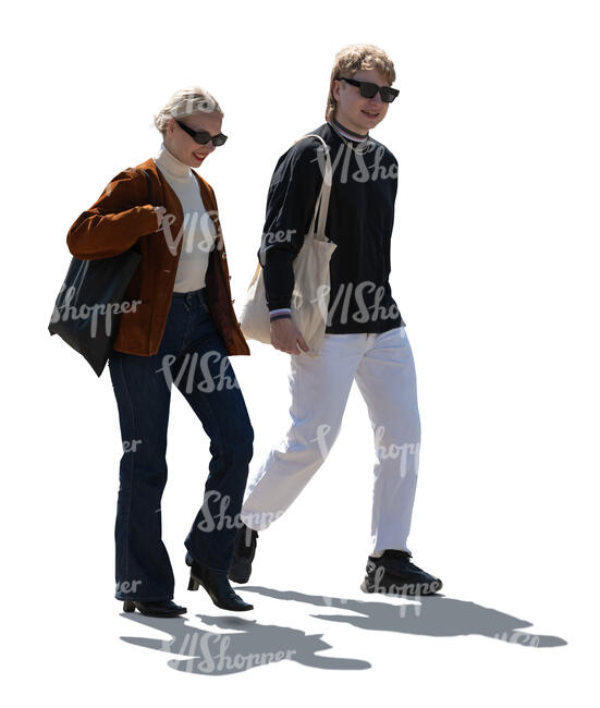 cut out backlit man and woman walking