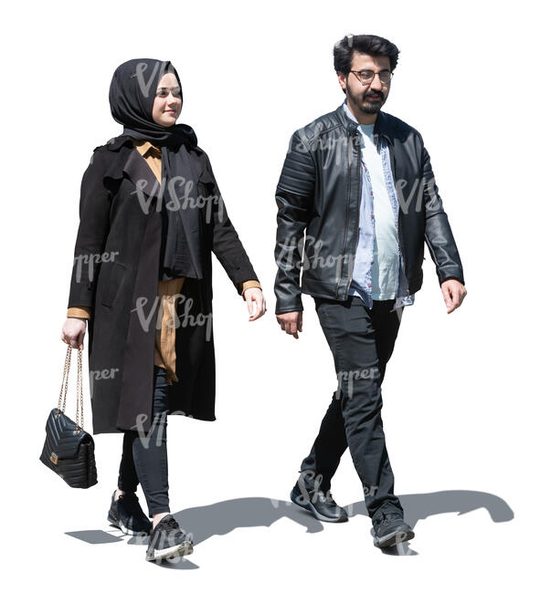 middle eastern man and woman walking