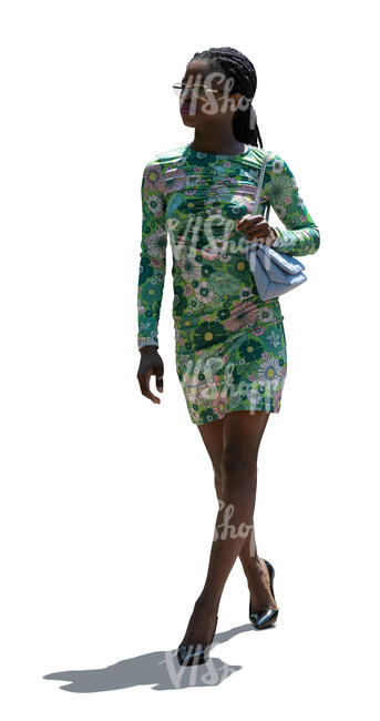 backlit black woman in a mini dress walking