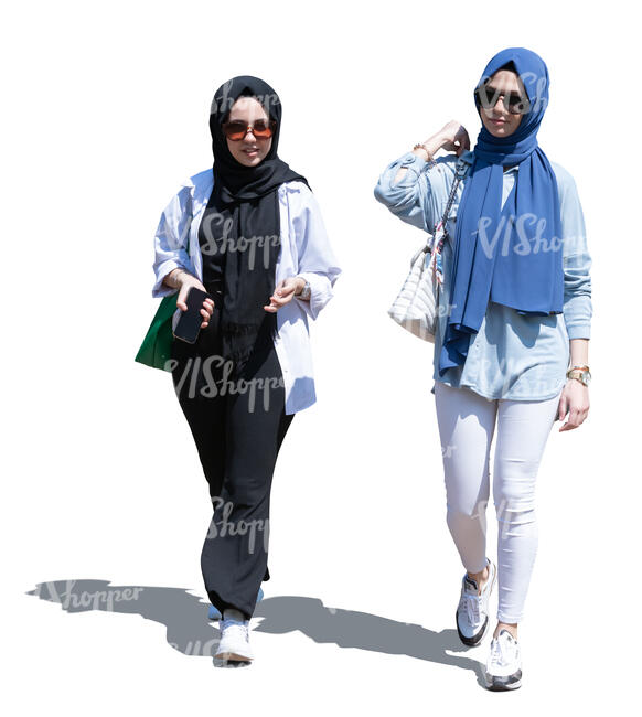 two cut out teenage muslim girls walking