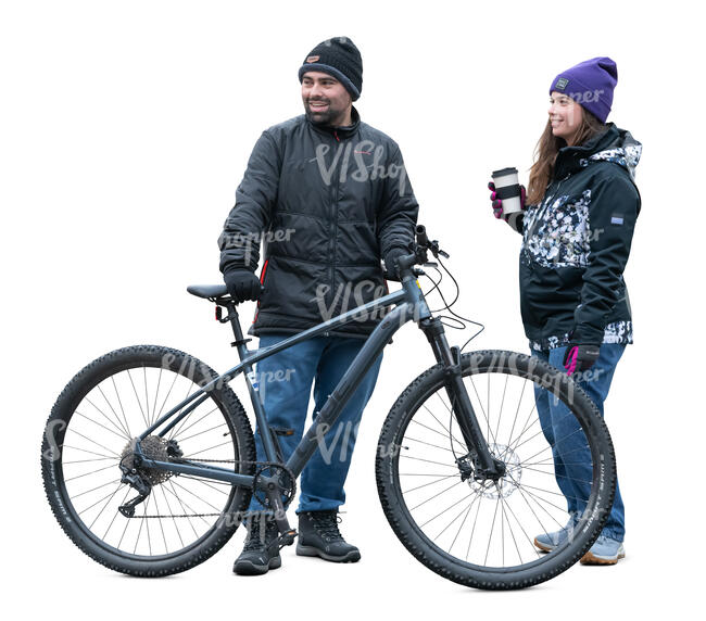 cut out man and woman standing with a bike in autumn