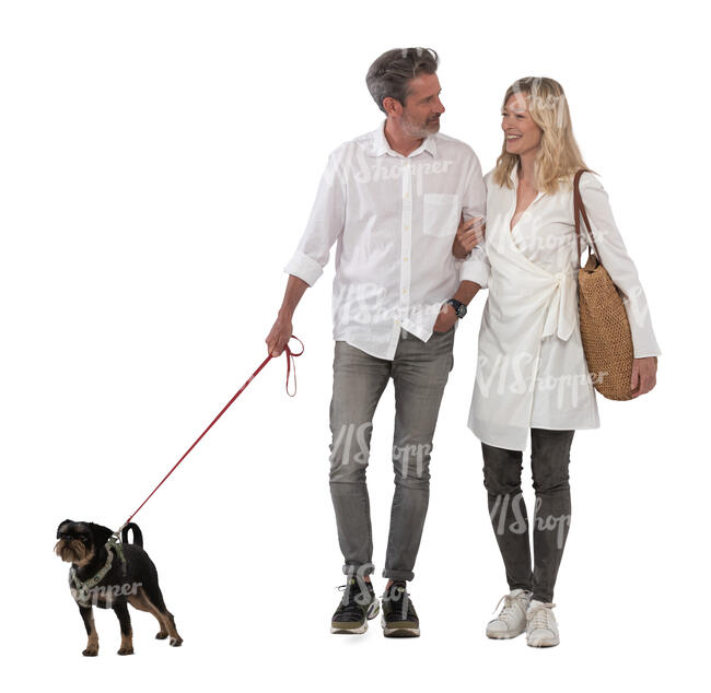 cut out happy middle aged couple walking a dog