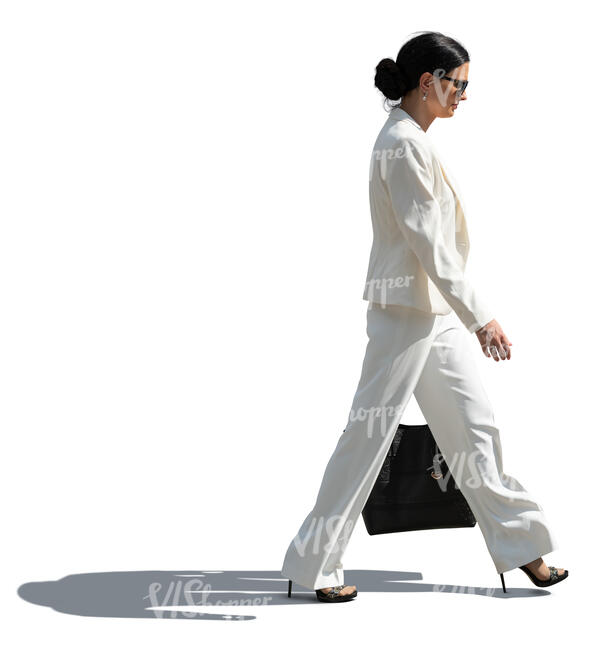 cut out woman in a white suit walking