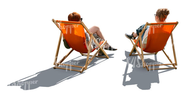 backlit women relaxing in garden chairs