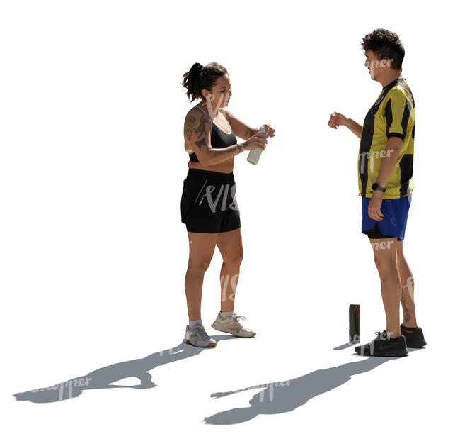 two cut out backlit people drinking water after workout