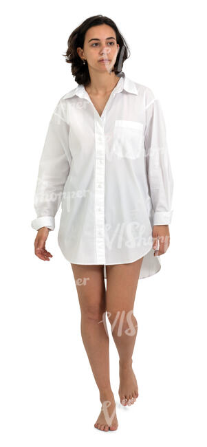 cut out woman wearing a white shirt walking barefoot