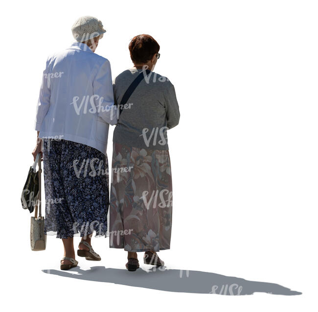 two cut out backlit older ladies walking