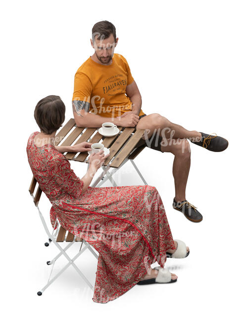 two people sitting in a cafe seen from above