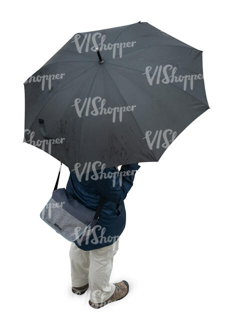 cut out woman with an umbrella standing seen from above