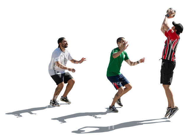 cut out backlit group of men playing basketball