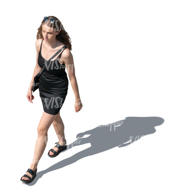 cut out woman in a black mini dress walking