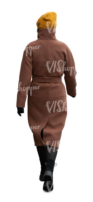 woman in a brown overcoat walking