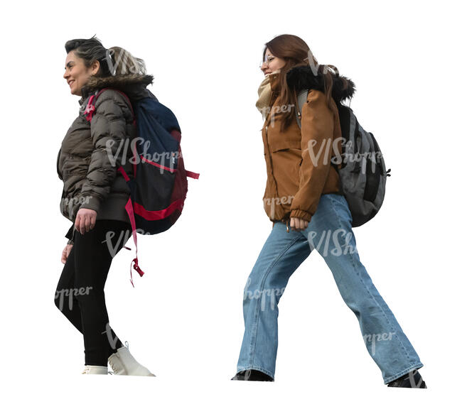 two cut out women walking seen from below