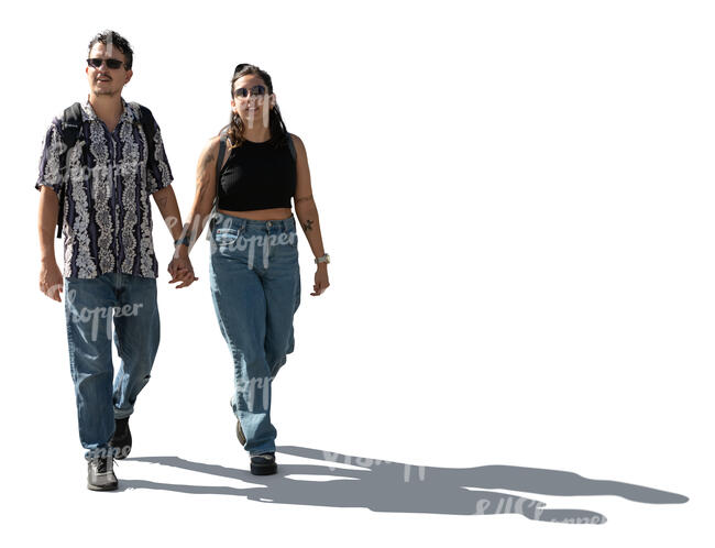 cut out backlit couple walking hand in hand