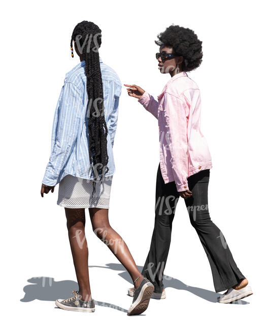 two black women walking and talking