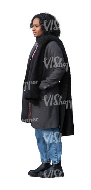 cut out woman in a black overcoat standing