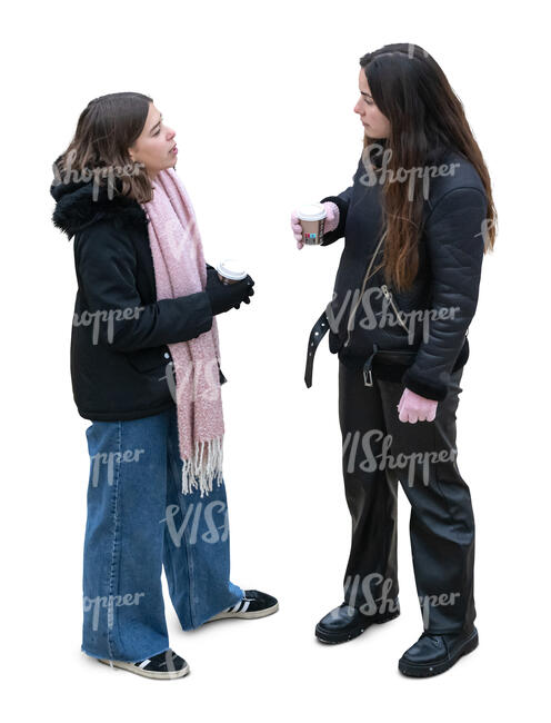 top view of two girls in winter drinking hot drinks