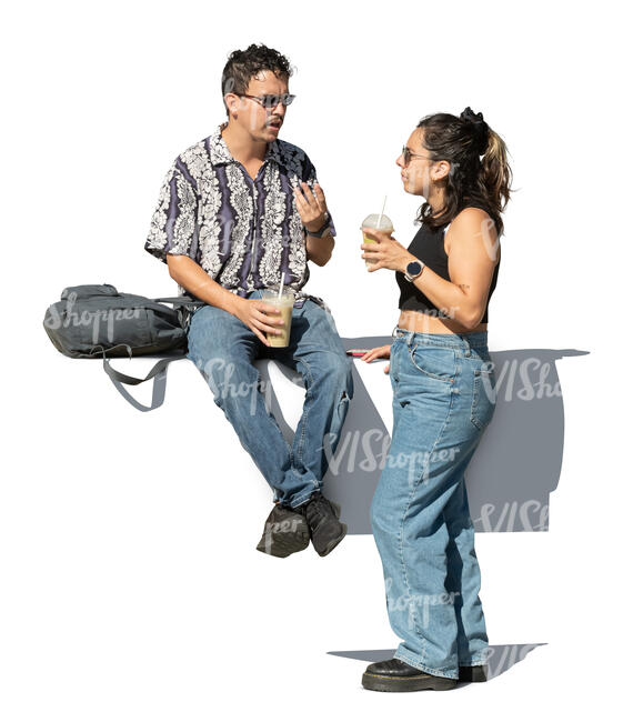 man and woman eating and drinking in the street