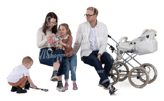 family with two kids and a stroller sitting