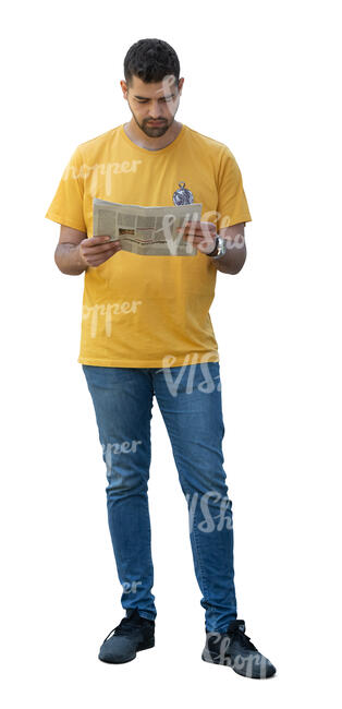 man standing and reading a newspaper