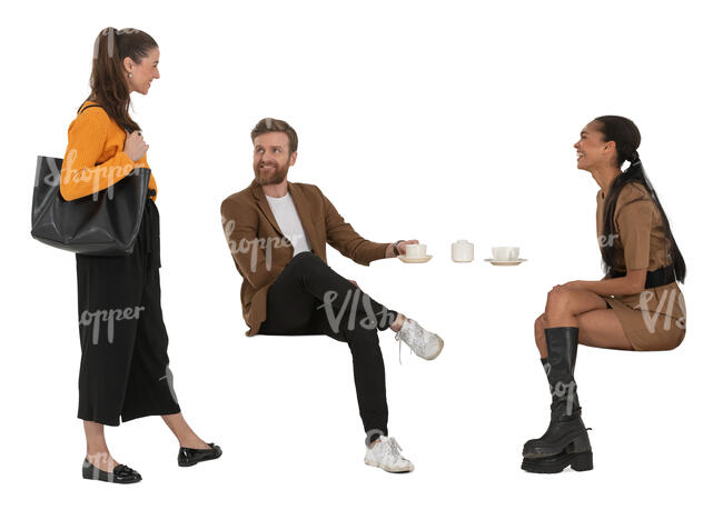 woman talking to two friends sitting in a cafe