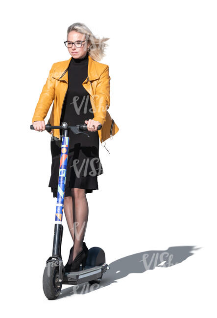 cut out backlit woman in a dress riding a scooter
