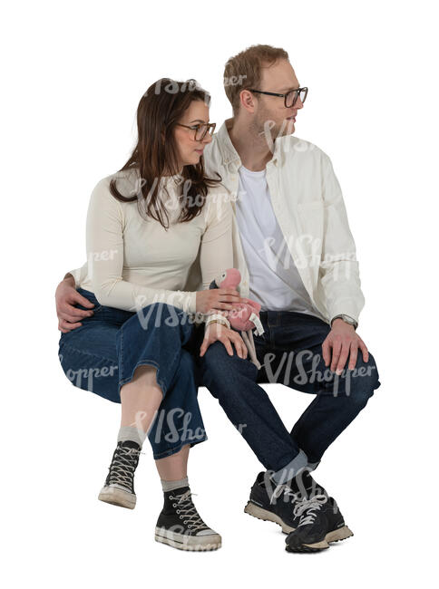 cut out couple sitting together and looking at smth