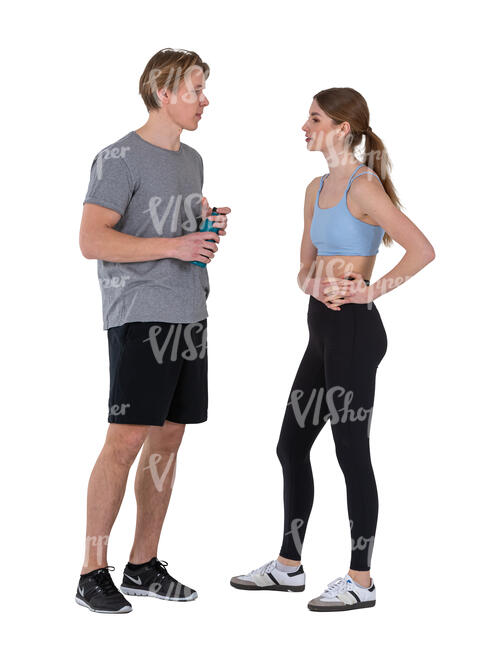 man and woman talking after a workout