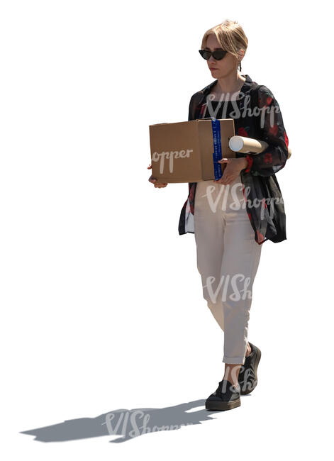 cut out backlit woman carrying a box