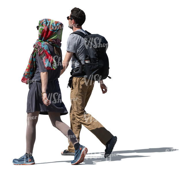 two cut out people walking hand in hand