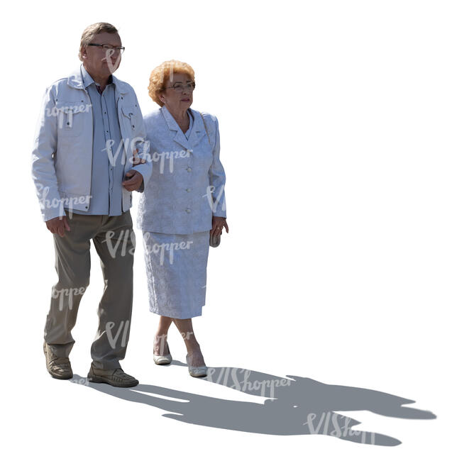 cut out backlit elderly couple walking arm in arm