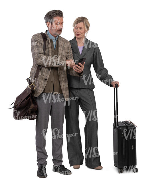 two people with travel bags standing and looking at a phone