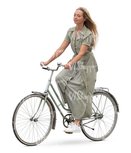 woman in a long dress riding a bike
