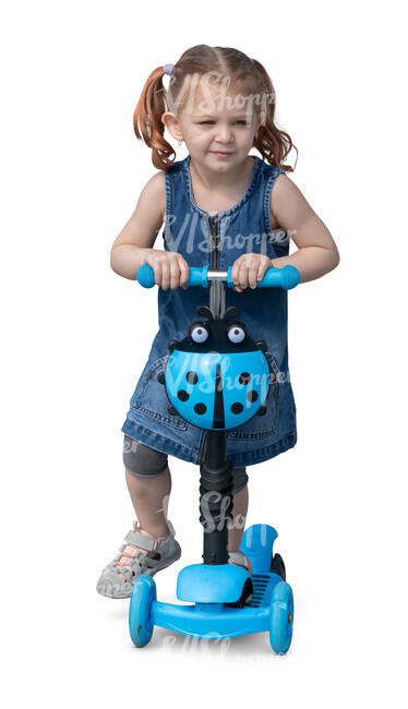 little girl riding a scooter