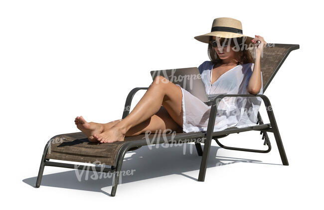 woman sitting in a beach chair and looking at a computer