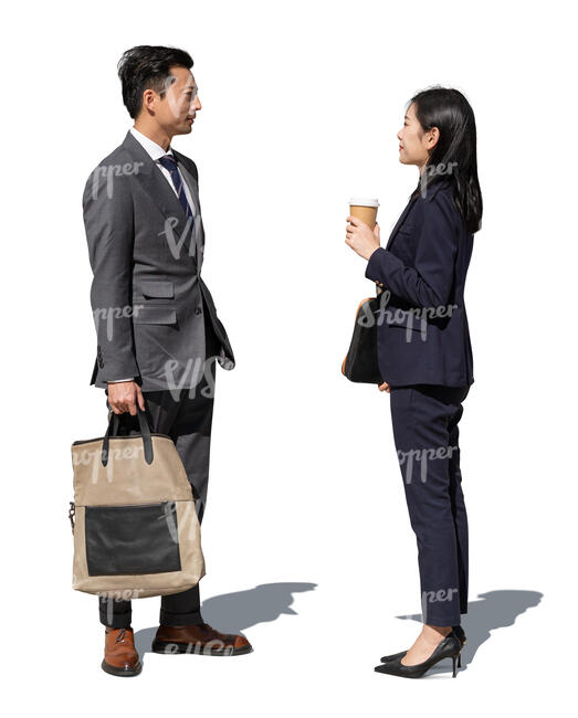 asian business people standing outside and talking