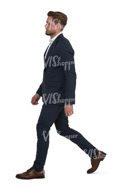 man in a dark suit walking