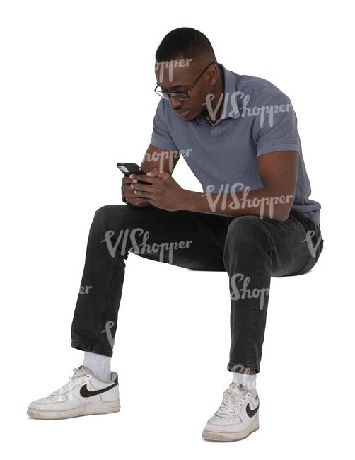 cut out black man sitting and texting