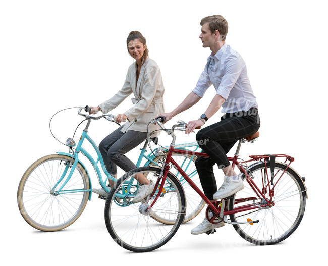man and woman riding bikes side by side and talking
