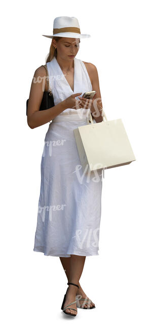 cut out fancy woman in a white dress with a shopping bag standing