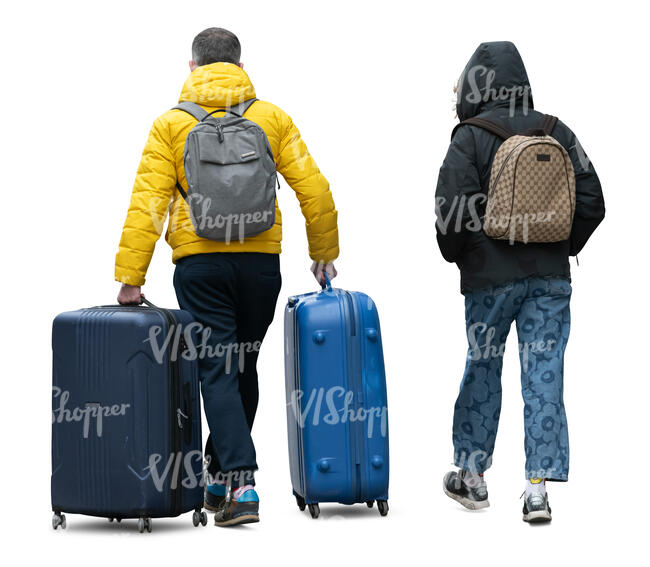 two people with large suitcases walking