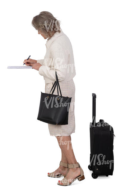 woman checking in at the hotel reception