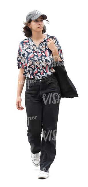 woman with a baseball cap walking
