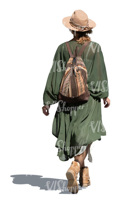 bohemian woman with a hat walking